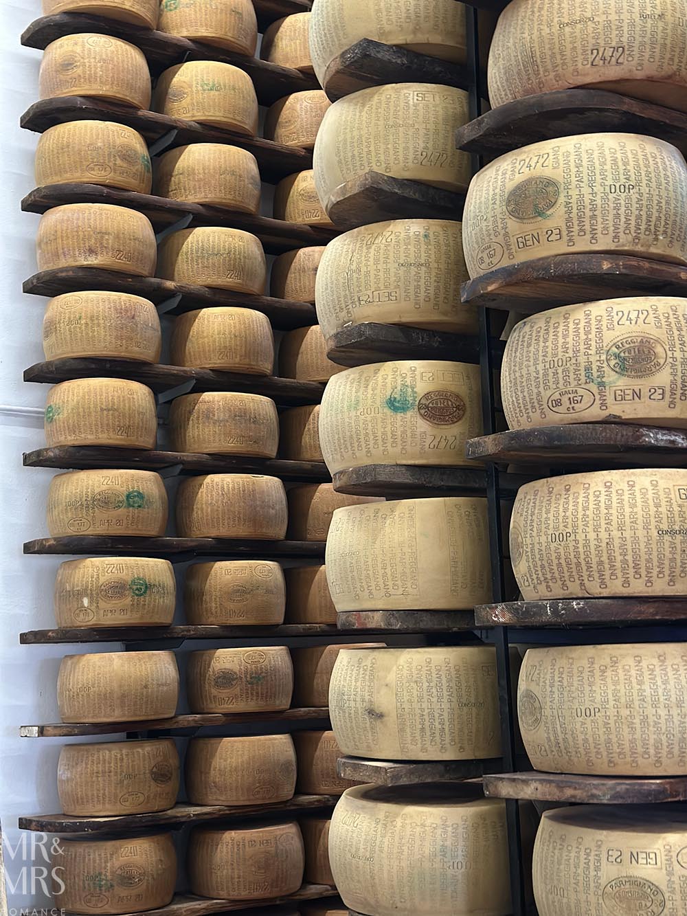 Wracks of older parmesan cheese. Tour of parmegiano reggiano parmesan cheese and prosciutto di Parma in Parma Italy