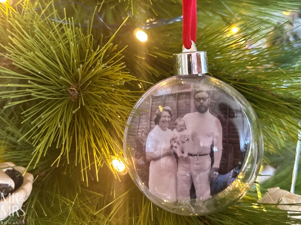 How to make Christmas memorable - black and white photo of Jim and his grandparents in a bauble