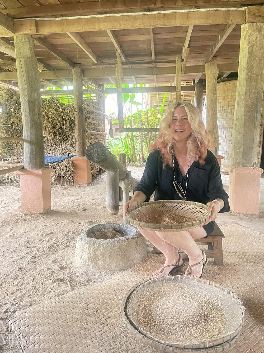 Living Land Farm Company, Luang Prabang, Laos - Christina sifting chaff from rice