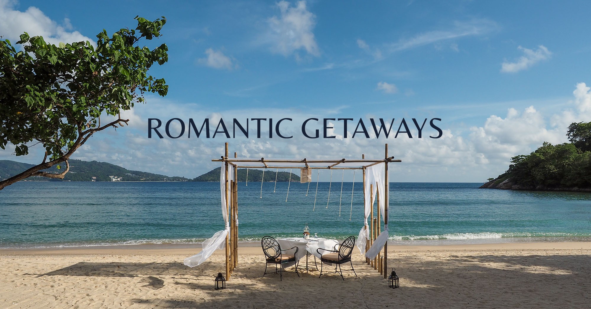 Christina and Jim - Mr and Mrs Romance and table setting on the beach in Phuket, Thailand - hero image for Romantic Getaways hub page