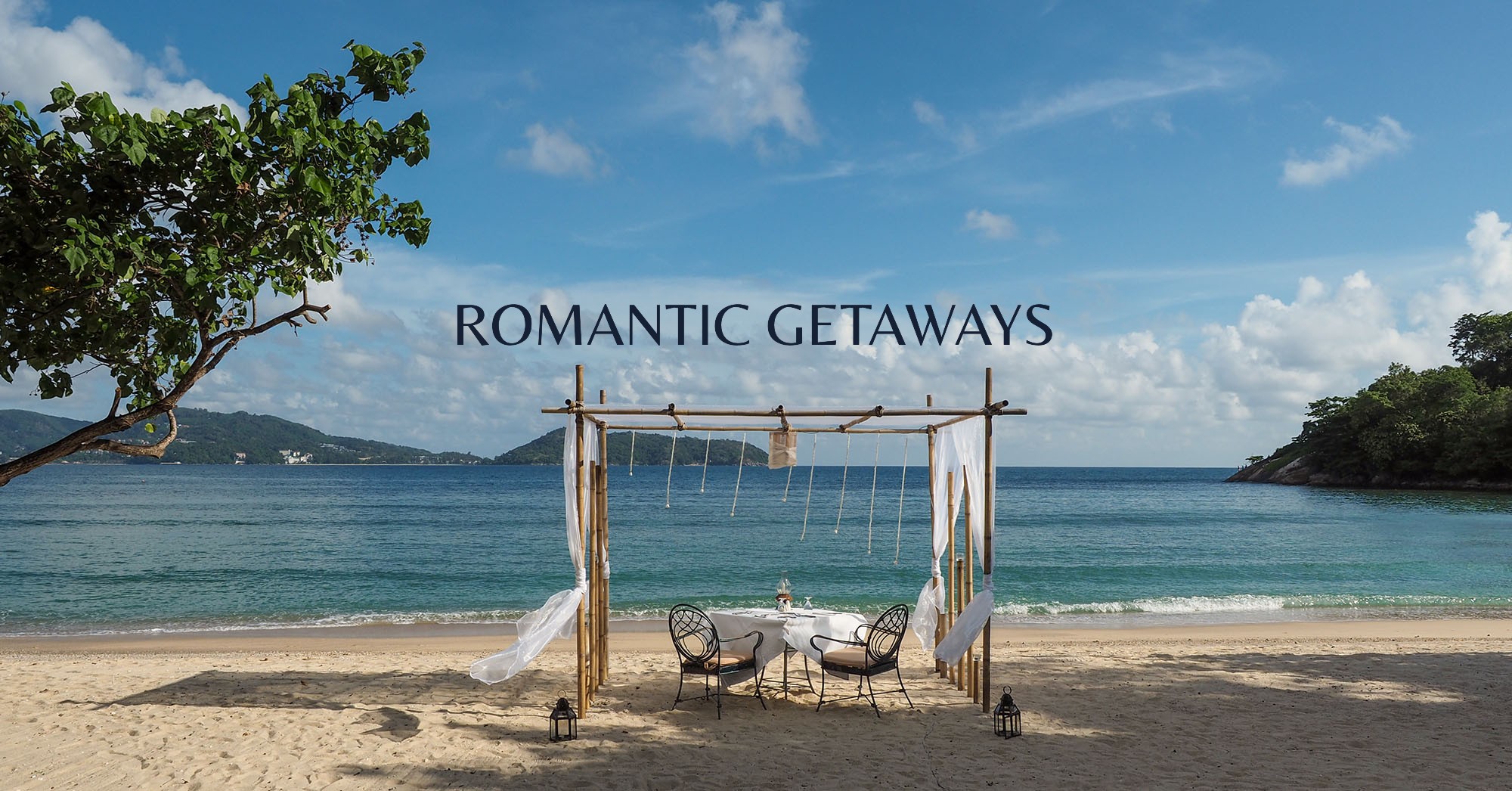 Christina and Jim - Mr and Mrs Romance and table setting on the beach in Phuket, Thailand - hero image for Romantic Getaways hub page