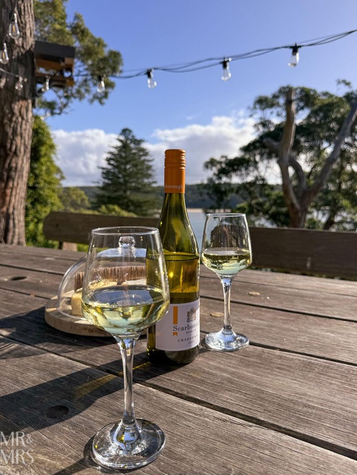 Simpson Cottage Review - wine and cheese on the table looking out over the bay