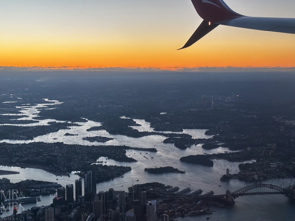 Flavour of the Month - August 2026 - Solomon Islands - flying out of Sydney with sunset and Sydney Harbour and Habour Bridge in shot