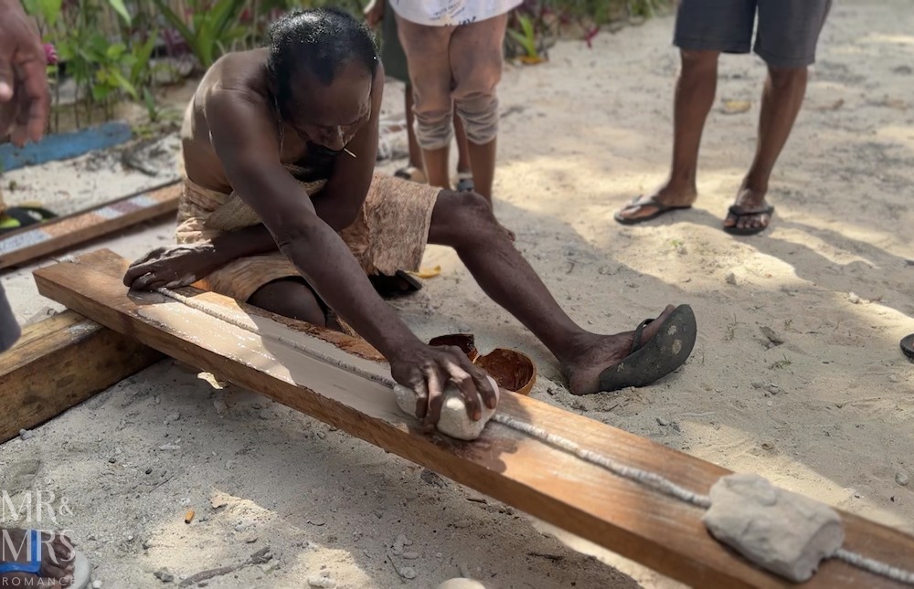 Flavour of the Month - August 2026 - Solomon Islands Shell Money Festival - man shows last stage of shell money production
