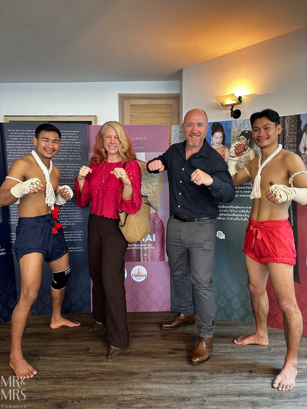 Flavour of the Month - August 2026 - Jim & Christina with Muay Thai boxers at Consul-General's house