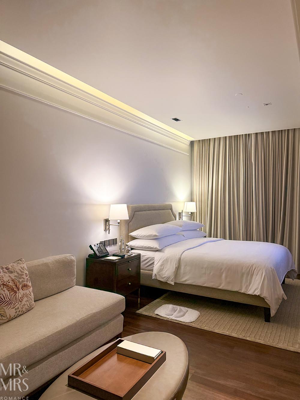 Oriental Residence Bangkok Hotel - bedroom including bed, sofa and coffee table