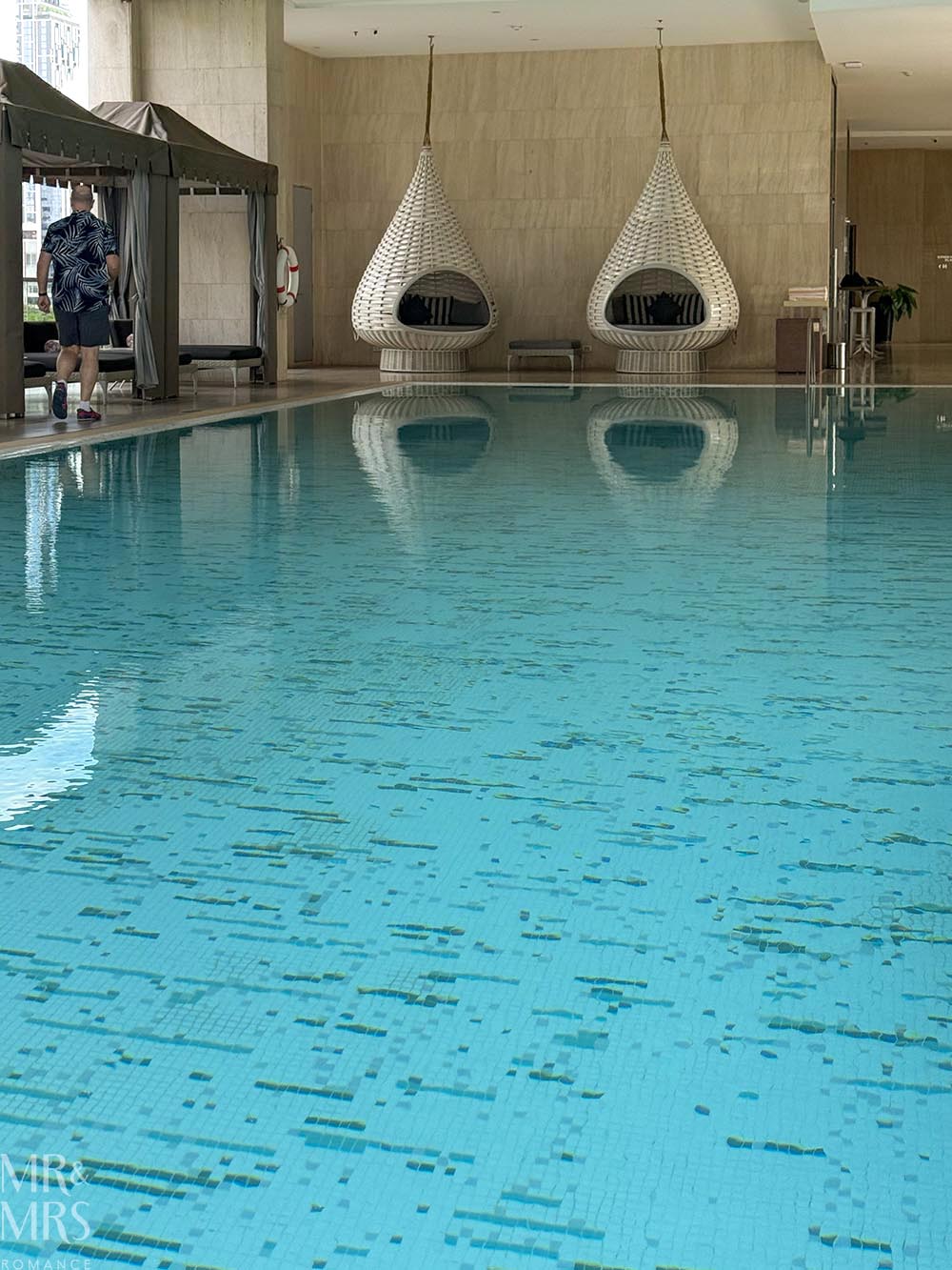 Oriental Residence Bangkok Hotel - rooftop pool with hanging chairs