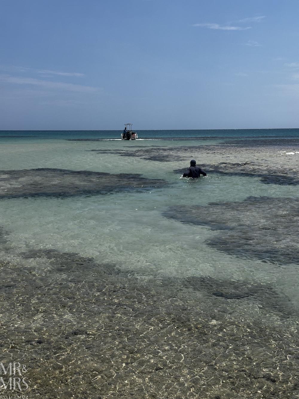 Flavour of the Month - September 2026 Mary's birthday trip to Fiji - Intercontinental at Natandola - Jim wading out to help stranded boat